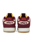 Heel of the Nike sb dunk low pro skate like a girl skating shoes in burgundy and cream