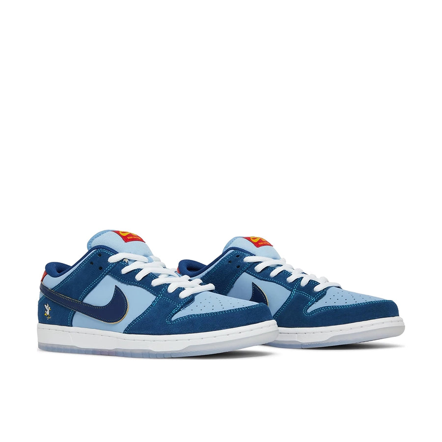 A pair of the Nike sb dunk low pro why so sad skating shoes in dark and light blue.