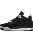 Side of Nike Air Jordan 4 retro black canvas basketball shoes are in an all black colourway.